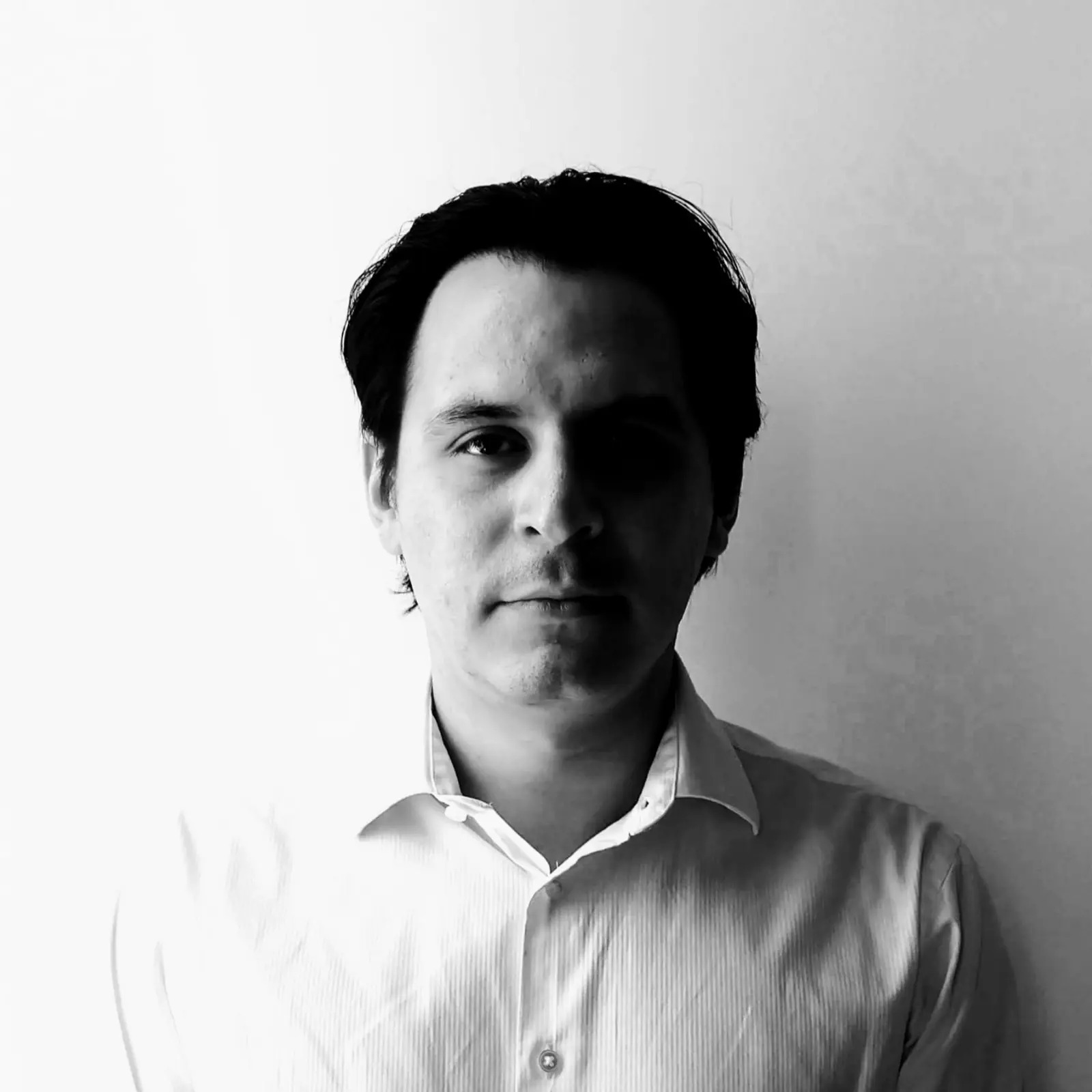 A black and white photo of JulioGitLab
